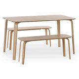 Light wood dining table set with two matching benches, minimalist style, side angle view