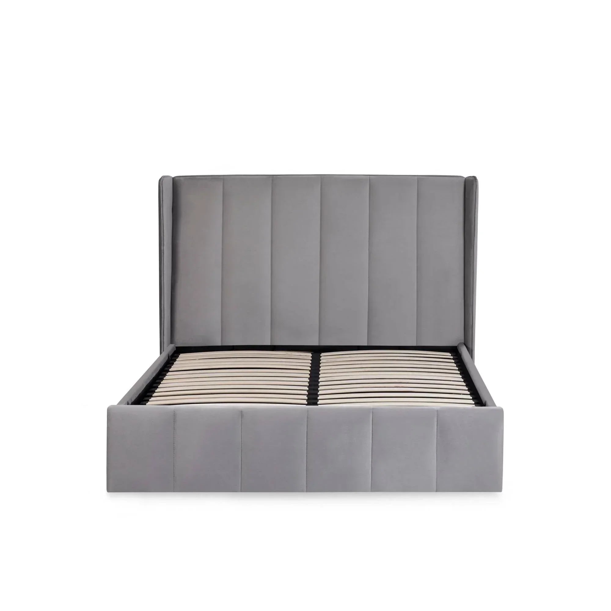 Grey upholstered bed frame with vertical panel headboard and wooden slatted base, front view