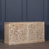 Carved wood sideboard with ornate floral patterns and four doors in neutral finish