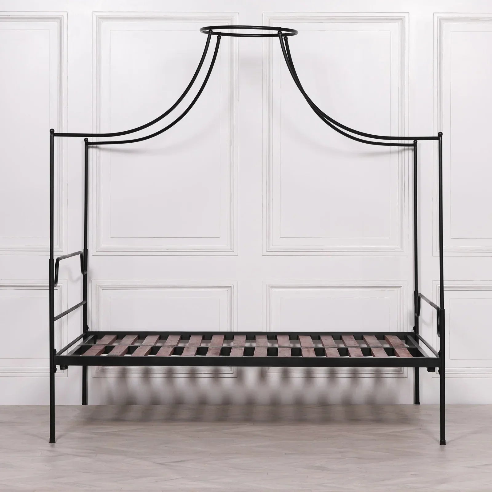 Black metal canopy bed frame with slatted wooden base and modern design