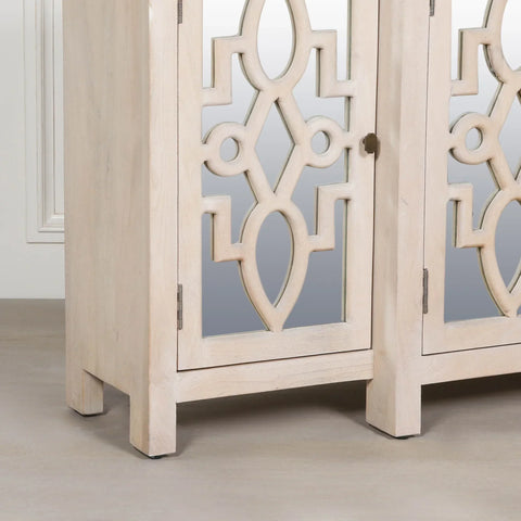 Light wood cabinet with mirrored door and geometric carved panel detail, front angle view