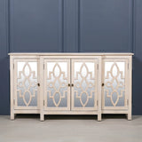 Four door mirrored sideboard with geometric wood pattern and light finish against blue wall