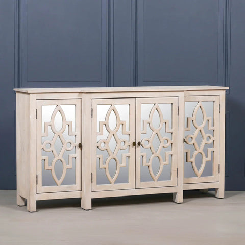 Beige wood sideboard with mirrored cabinet doors featuring geometric lattice design