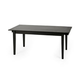 Black rectangular wooden dining table with tapered legs isolated on white background