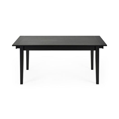Front view of black wooden rectangular dining table with tapered legs against white background
