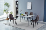 White marble dining table with black legs and four brown chairs in a modern dining room