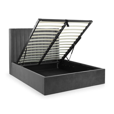 Grey ottoman storage bed with lifted slatted frame and vertical panel headboard