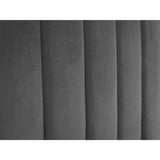 Close up of grey velvet upholstered bed headboard with vertical panel detailing