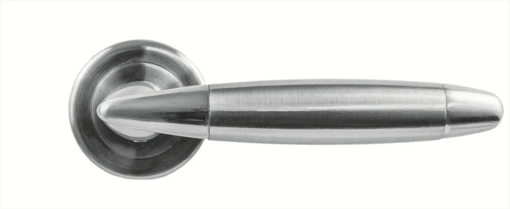 brushed chrome door handle on round rose, modern design, close up view