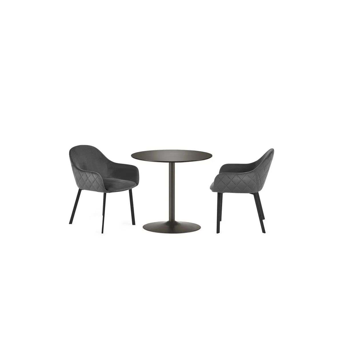 Black round dining table with two quilted grey velvet dining chairs