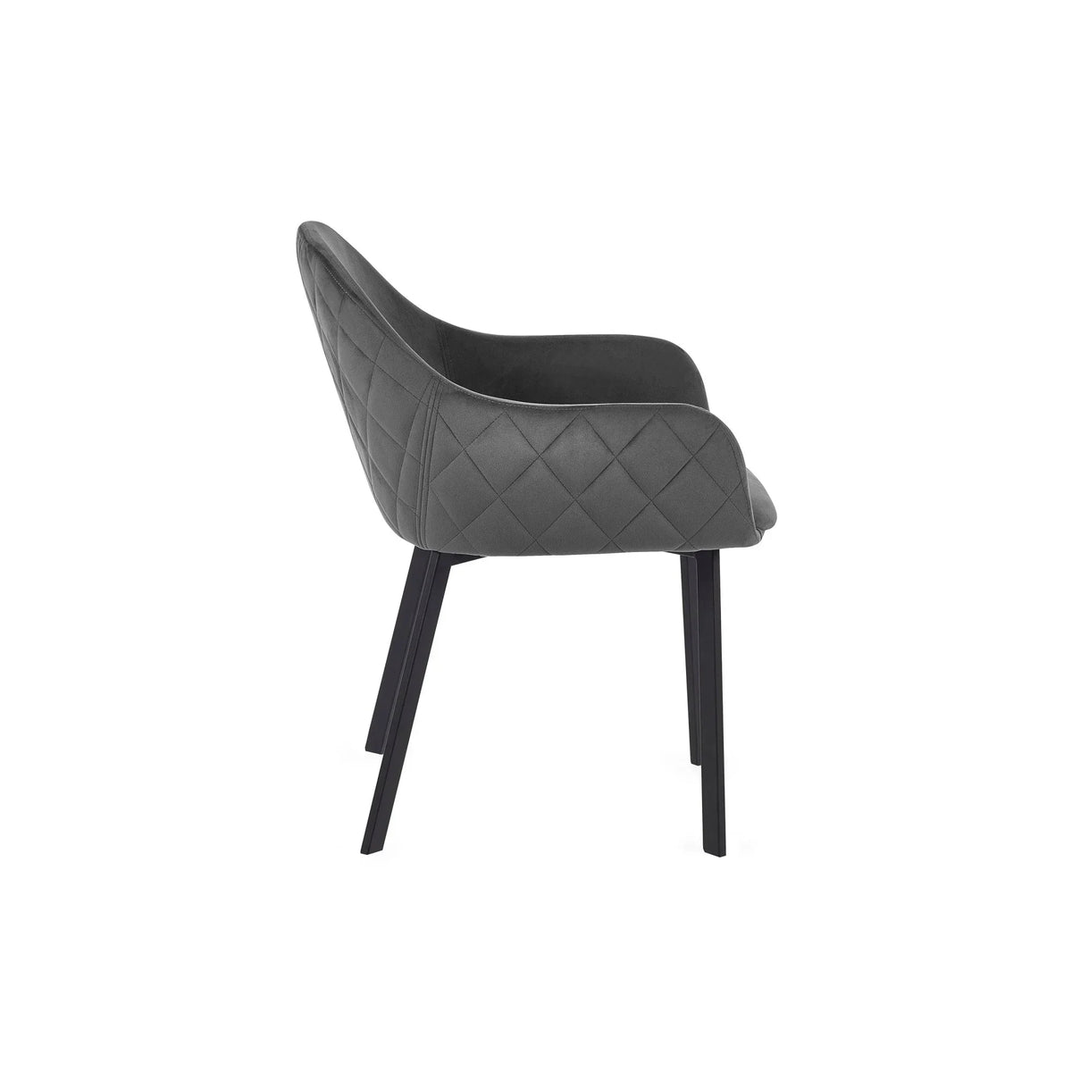 Side view of grey dining chair with quilted fabric and black metal legs