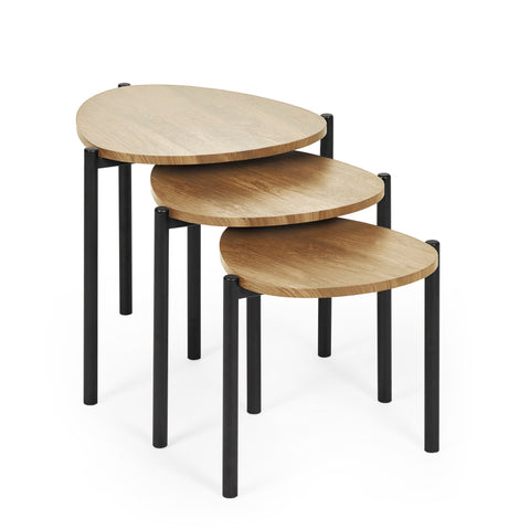Set of three teardrop side tables with light wood tops stacked spaced apart on white background.