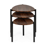 Close-up of dark wood tabletops and black metal legs on three teardrop nesting side tables set on white rug.