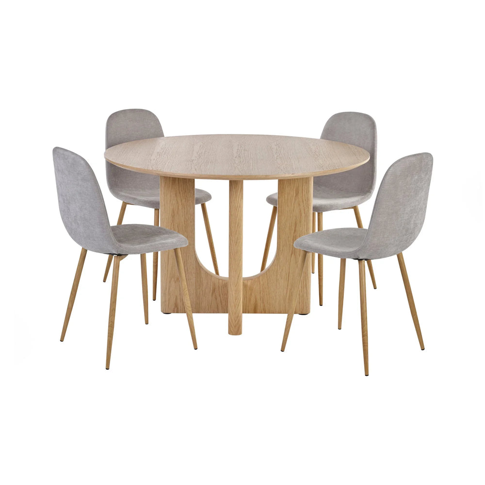 Round oak dining table with four grey fabric chairs, minimalist design on white background