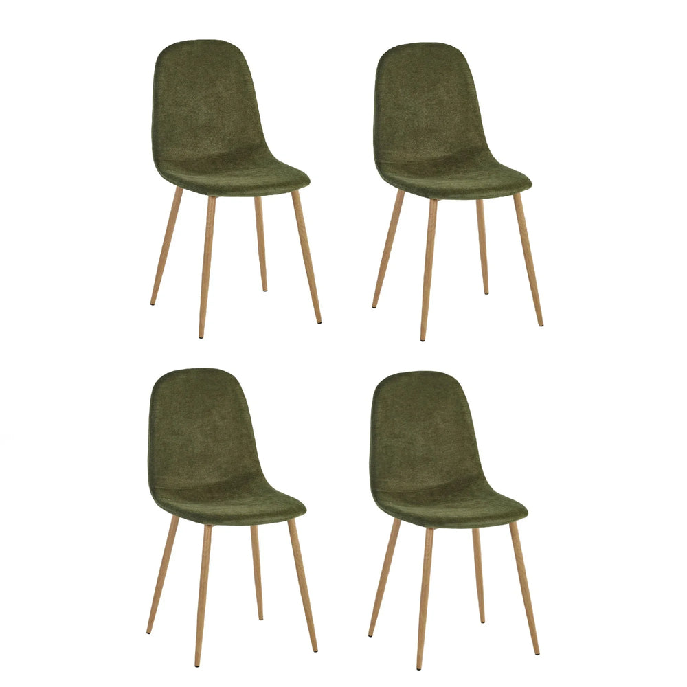 Set of four green fabric dining chairs with wooden legs on white background