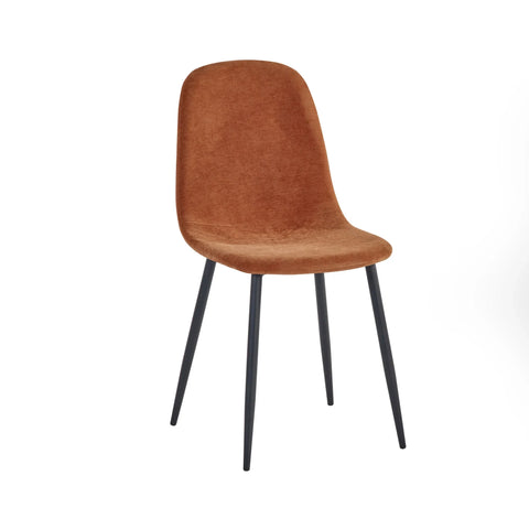 Brown velvet dining chair with black metal legs on white background