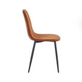 Side view of brown velvet dining chair with black metal legs