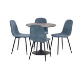 Round dining table set with four blue velvet chairs and black metal legs