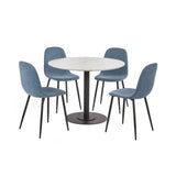 Round marble dining table with black pedestal base and four blue fabric chairs