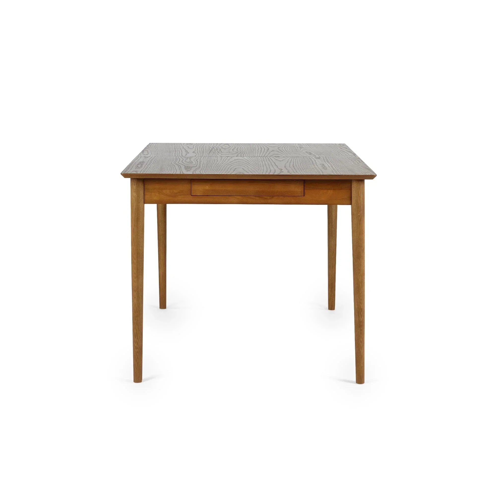 Rectangular wooden extending dining table with slim tapered legs, front view