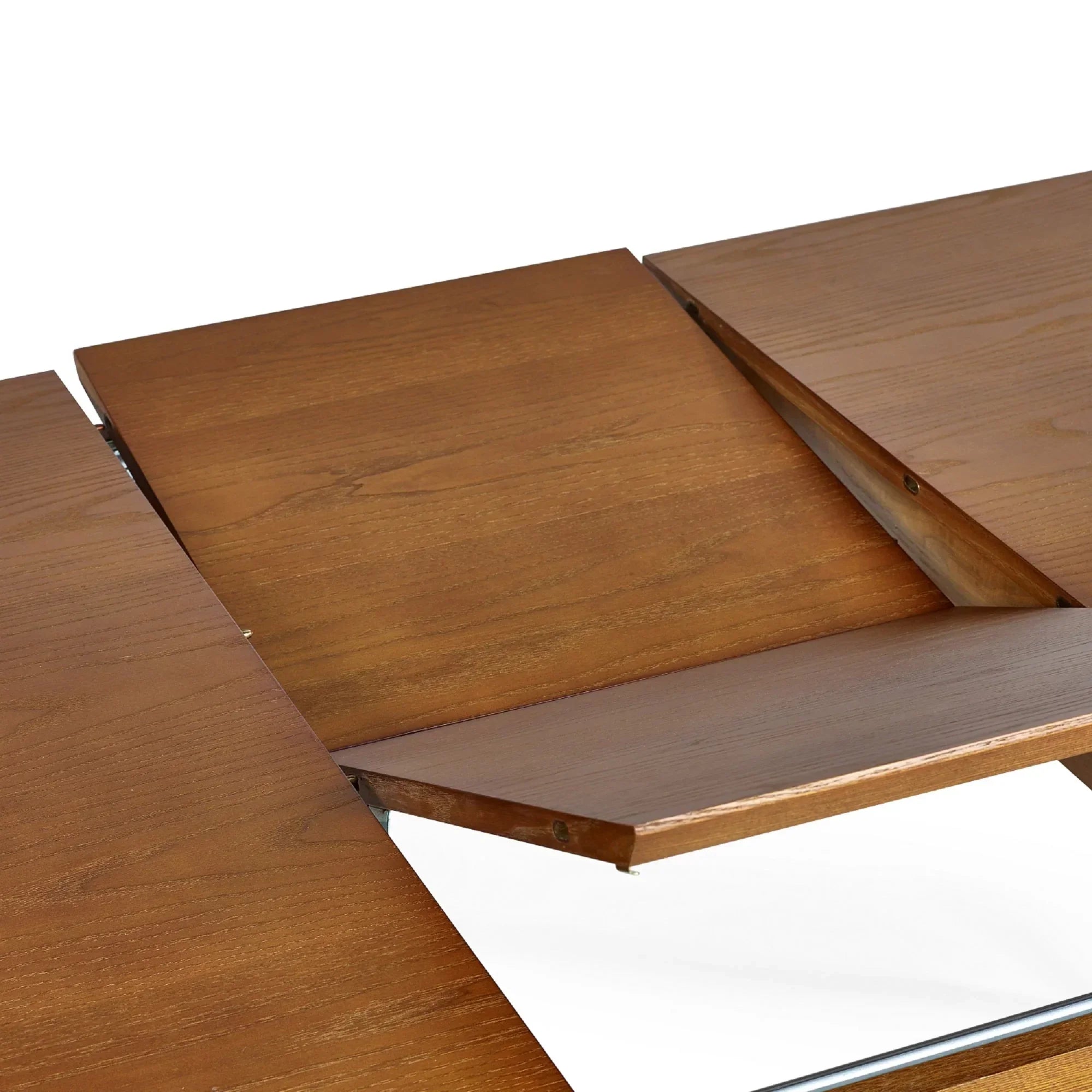 Oak wood extending dining table leaf detail in mid-extension