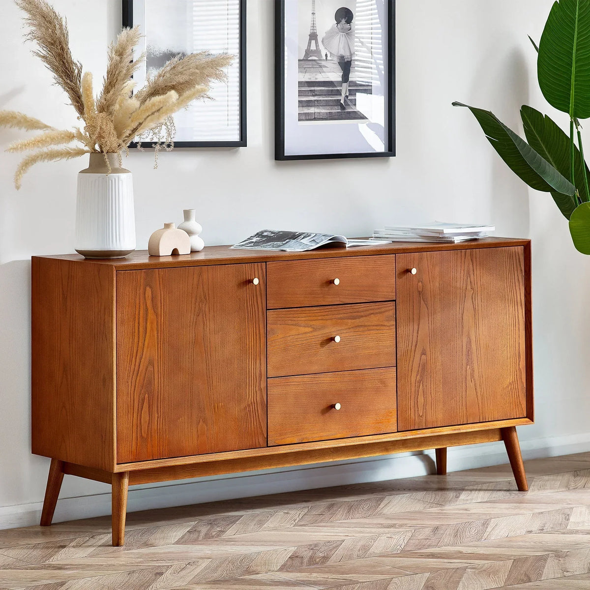 mid-century wooden sideboard with drawers and doors in modern living room setting