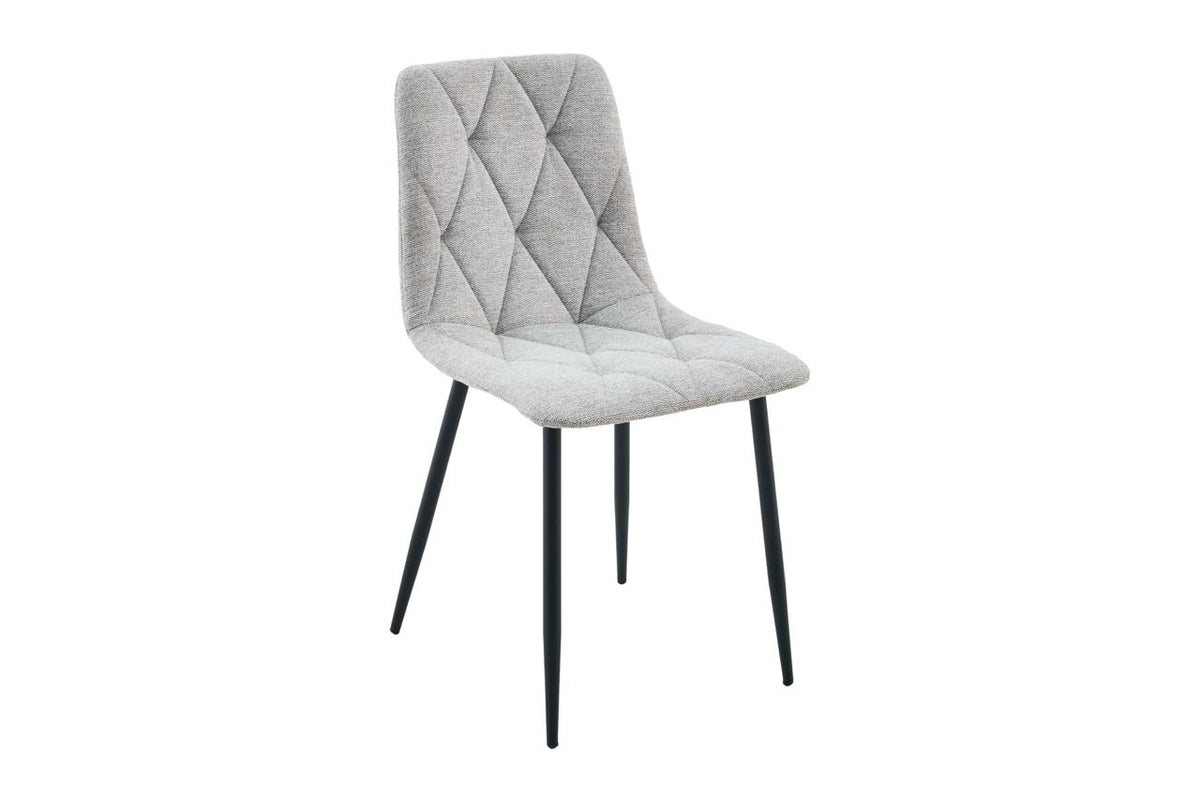 A modern dining chair with a light gray tufted fabric seat and backrest, supported by slim black metal legs, shown against a plain white background.
