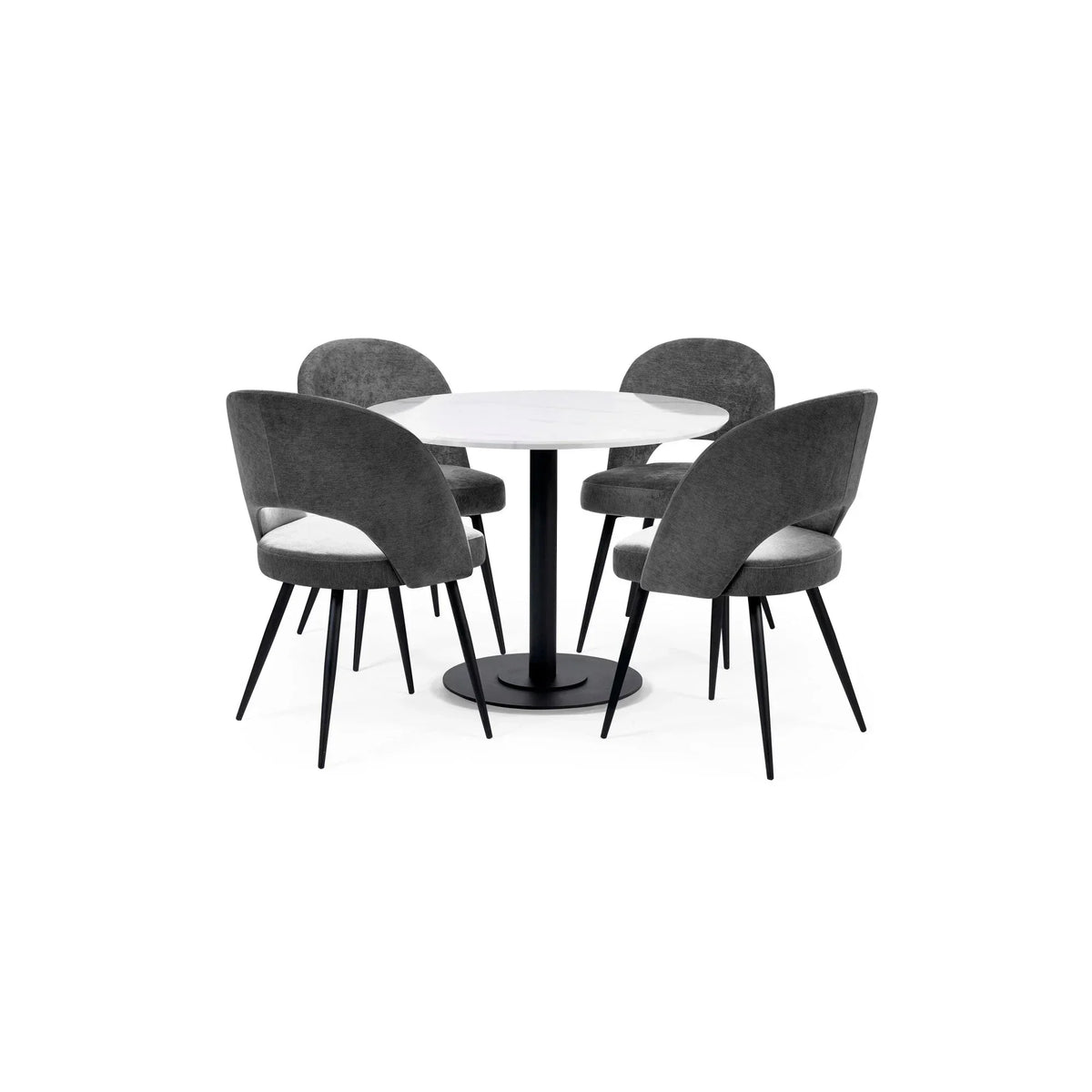Round dining table with white top and four grey velvet chairs on black metal legs