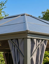 Grey metal garden gazebo with fabric curtains and polycarbonate roof