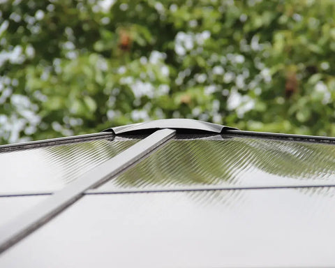 Close up of grey garden gazebo roof panel with polycarbonate material outdoors