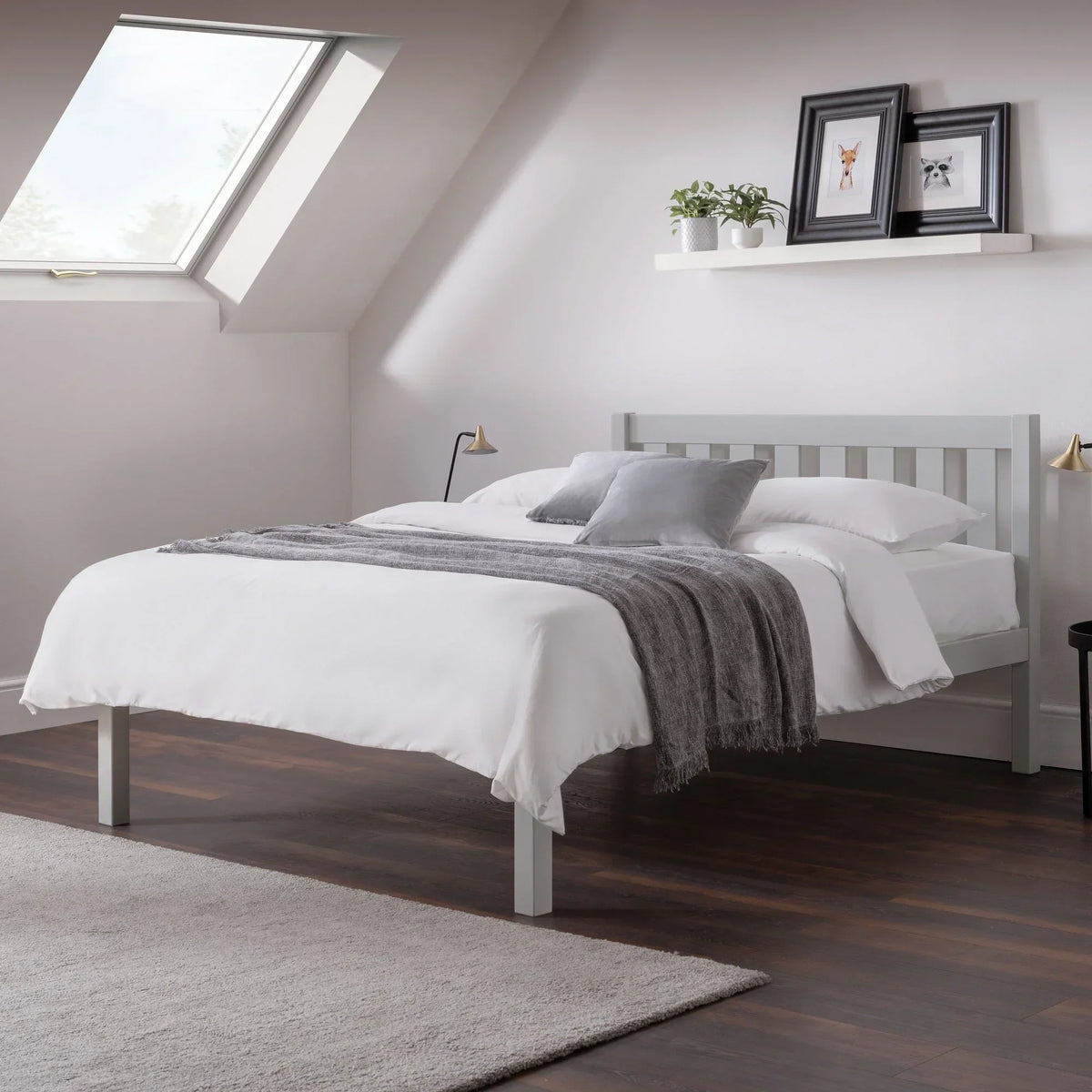 Dove grey double bed with slatted headboard, white bedding, grey throw in modern bedroom
