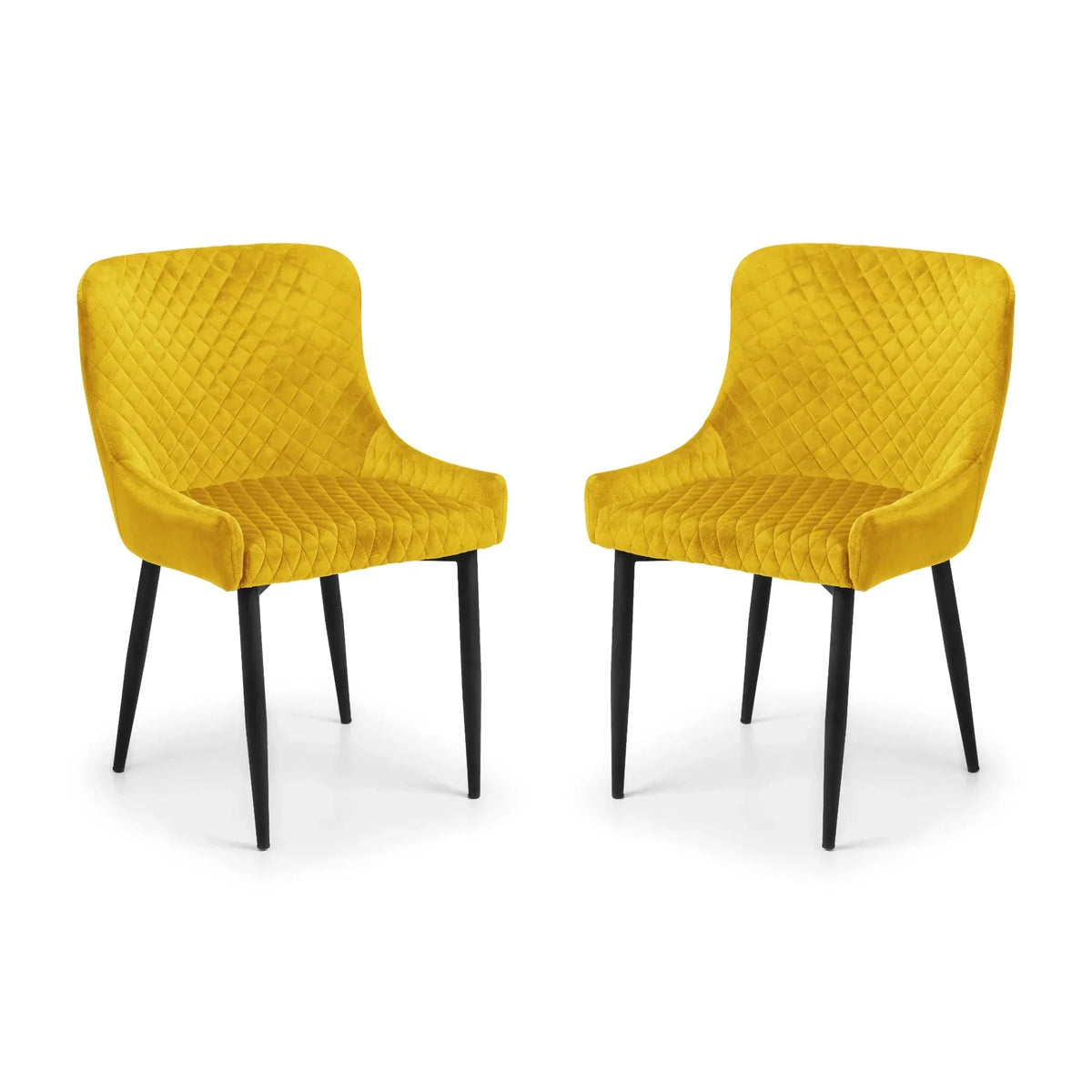 Pair of mustard velvet dining chairs with diamond quilted upholstery and black metal legs