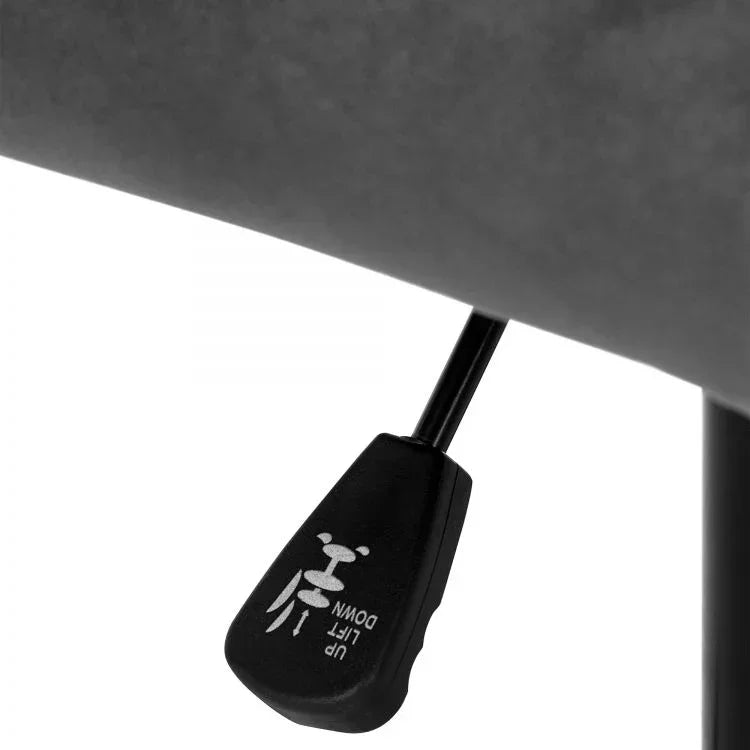 Closeup of office chair lever with up and down lift adjustment under seat