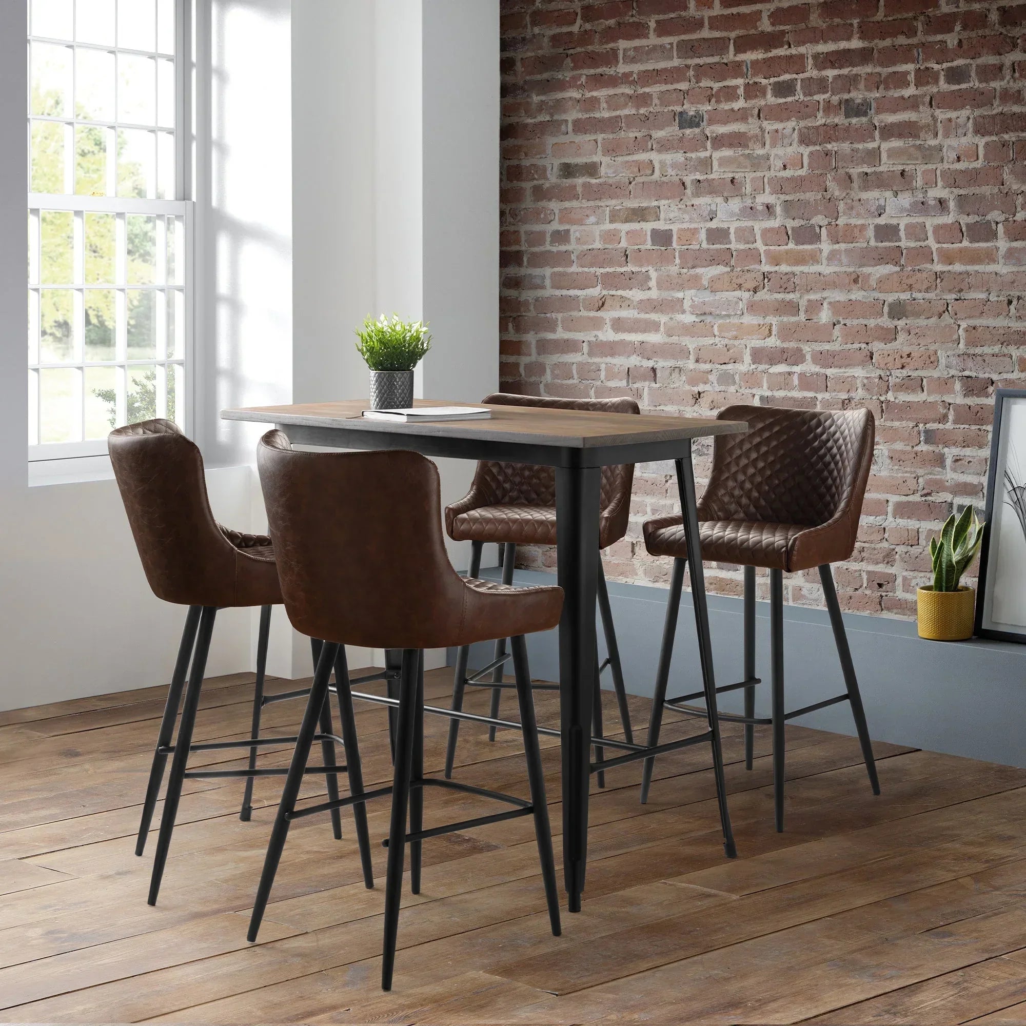 Brown faux leather bar stools with quilted backs around a tall dining table in a modern room