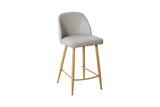 Taupe counter stool with upholstered seat, curved backrest and oak legs, side view