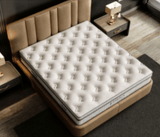 Cream tufted mattress on upholstered bed in modern bedroom | Home Centre Direct UK