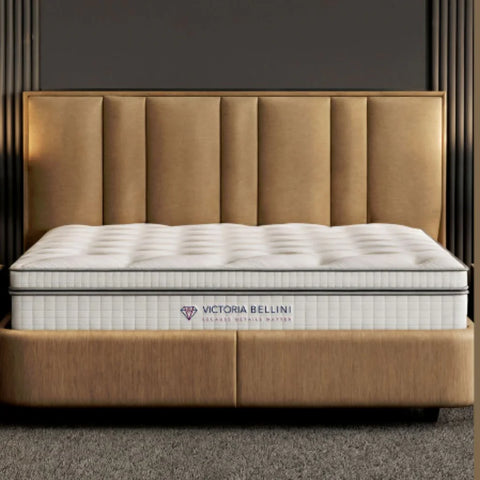 Upholstered headboard with deep tufted mattress in warm neutral bedroom setting
