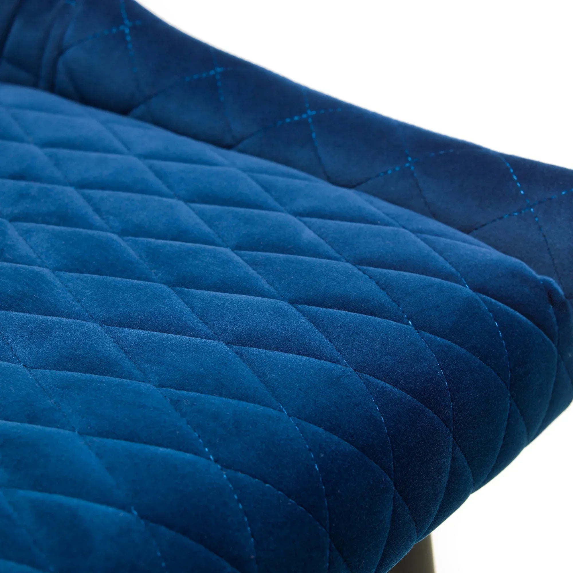 quilted blue velvet bar stool seat close-up with diamond stitching