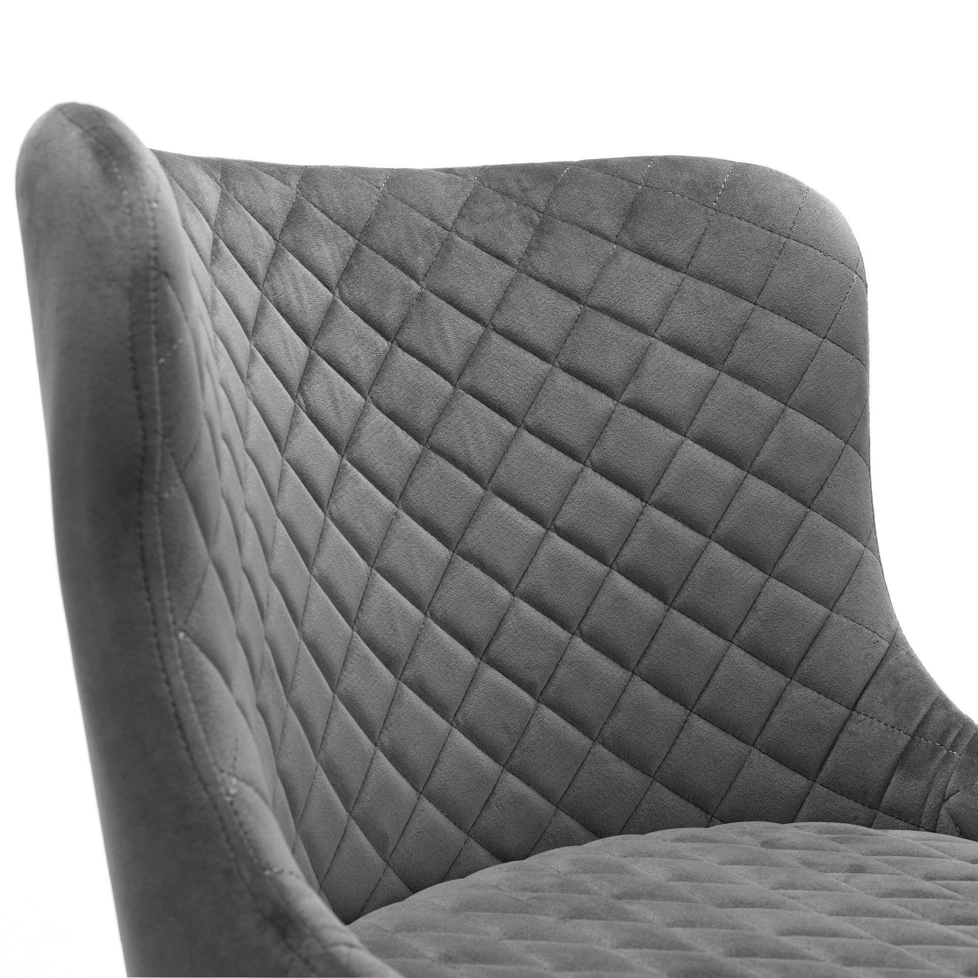 Close-up of grey bar stool with quilted fabric backrest and seat detail