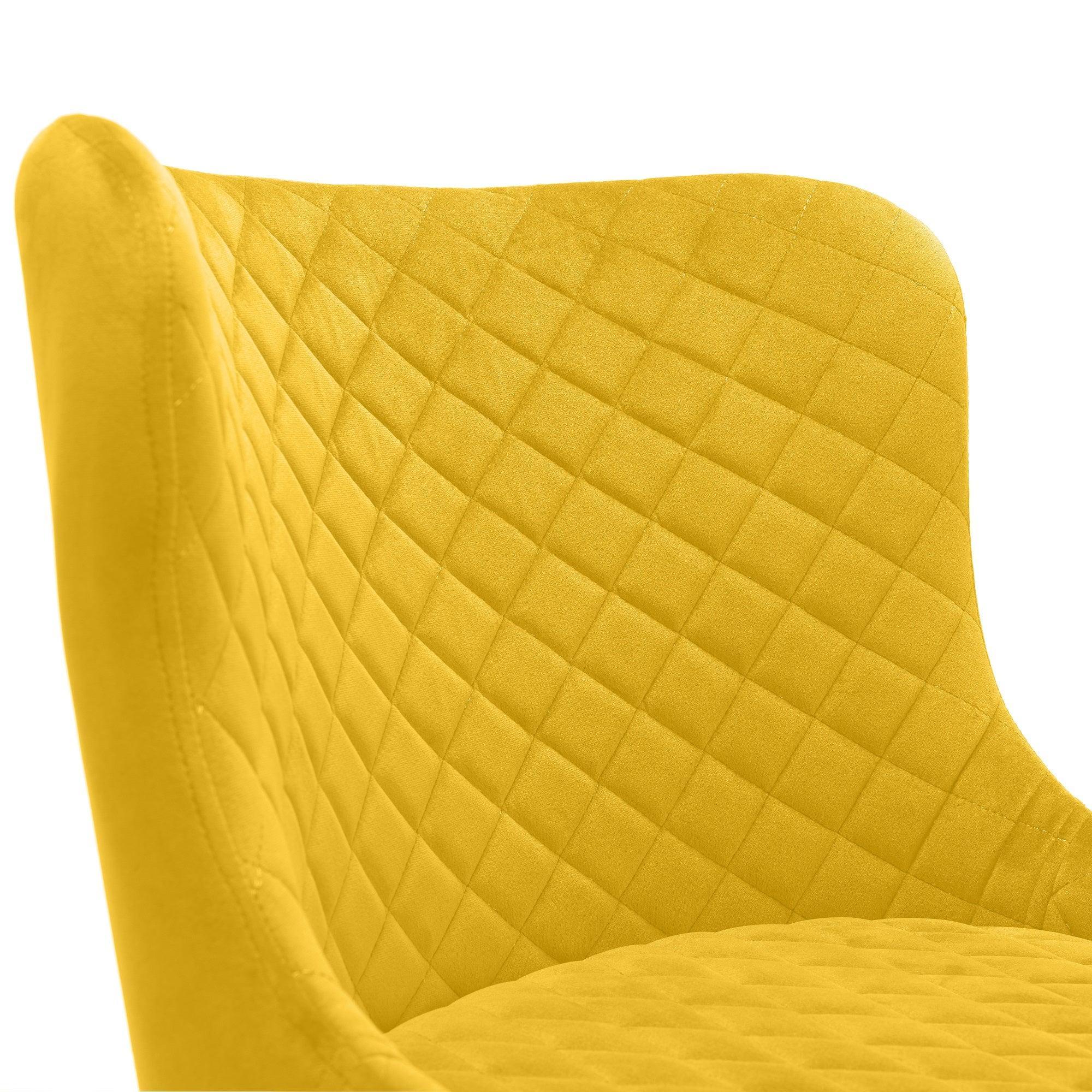 Mustard bar stool with quilted velvet backrest and seat, close detail view