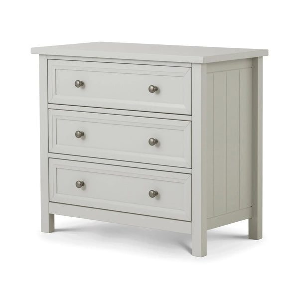 White wooden chest of drawers with three drawers and metal handles, angled side view