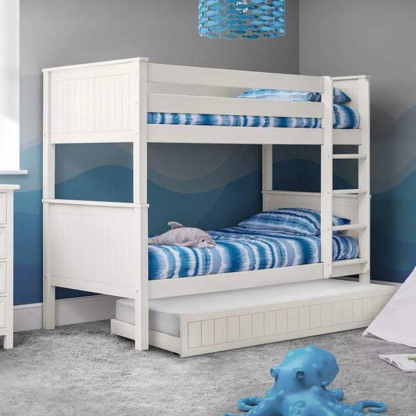 White wooden bunk bed with built-in ladder and underbed storage drawer in kids' bedroom