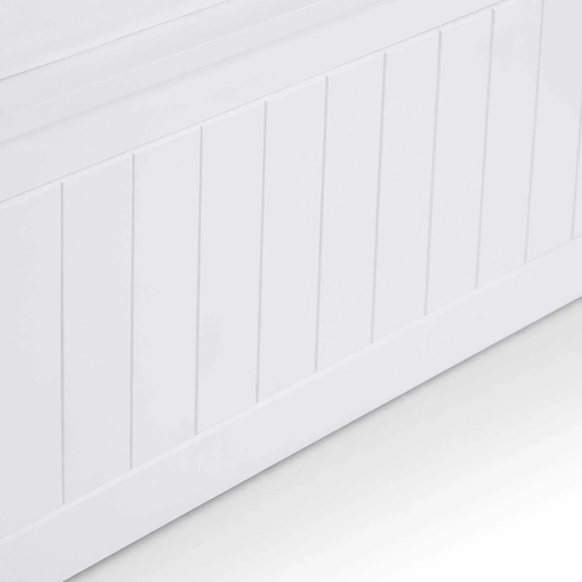 White wooden storage bench with vertical panel detail on front