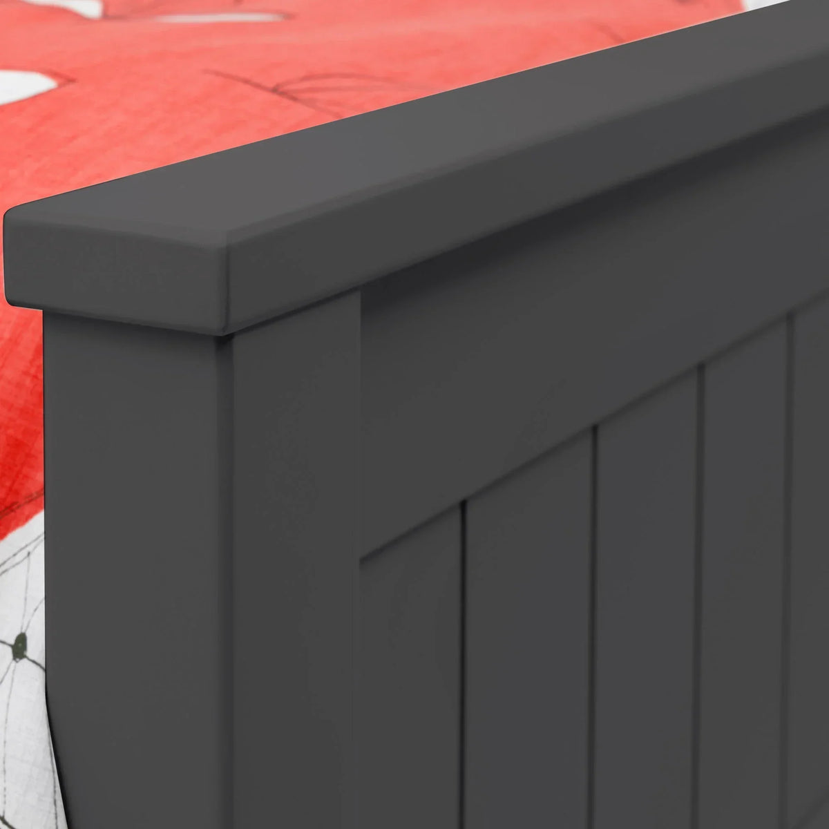 Close-up of anthracite bookcase bed footboard with vertical panel detail