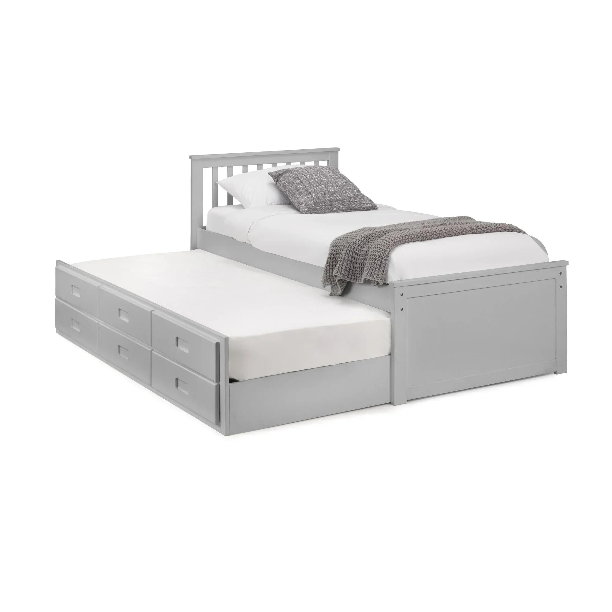 Grey wooden trundle bed with storage drawers and white bedding, side view