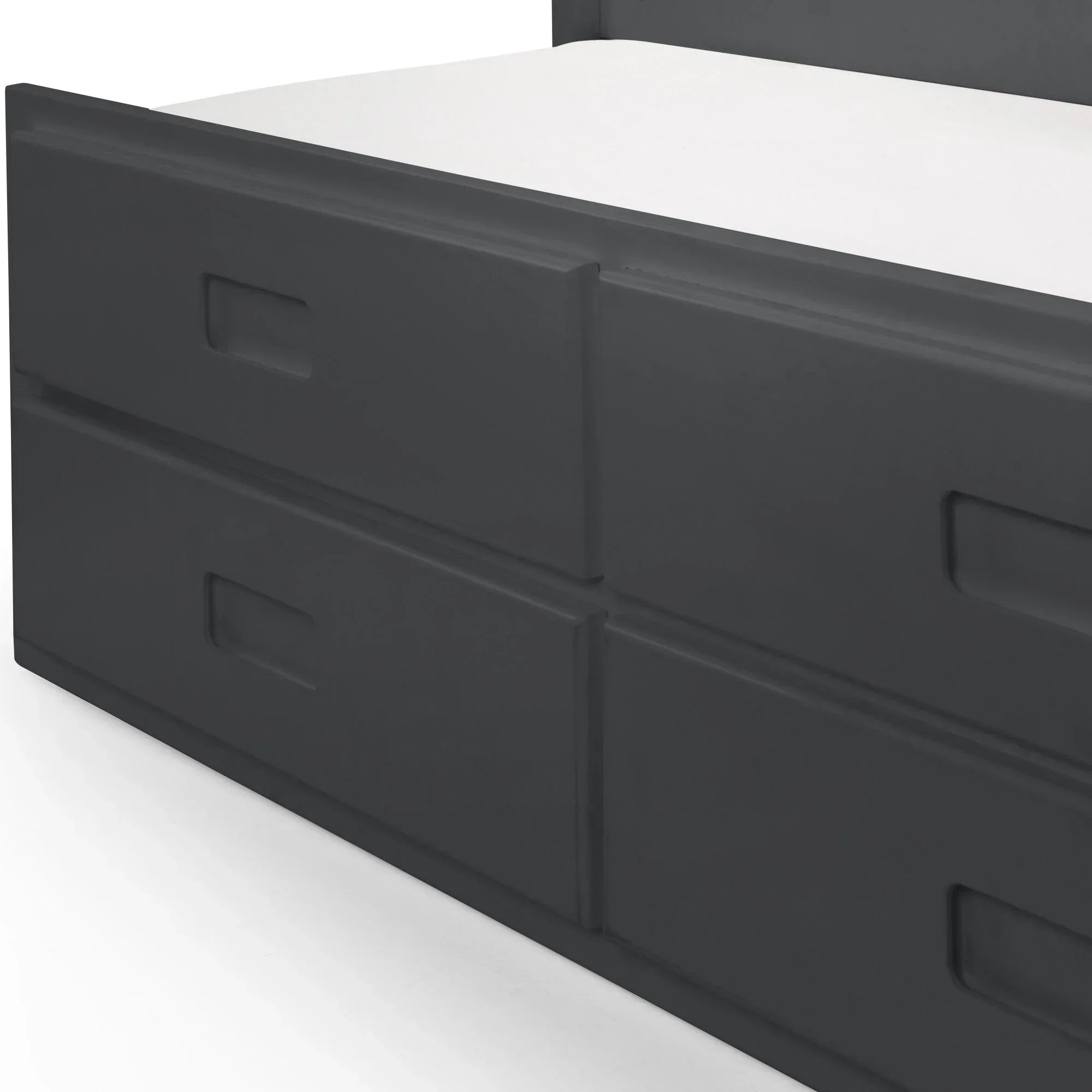 Close-up of grey storage bed with four integrated drawers and recessed handles