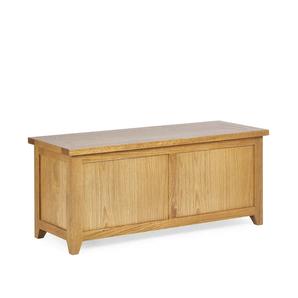 Oak wood storage bench with panelled front and rectangular top, angled side view