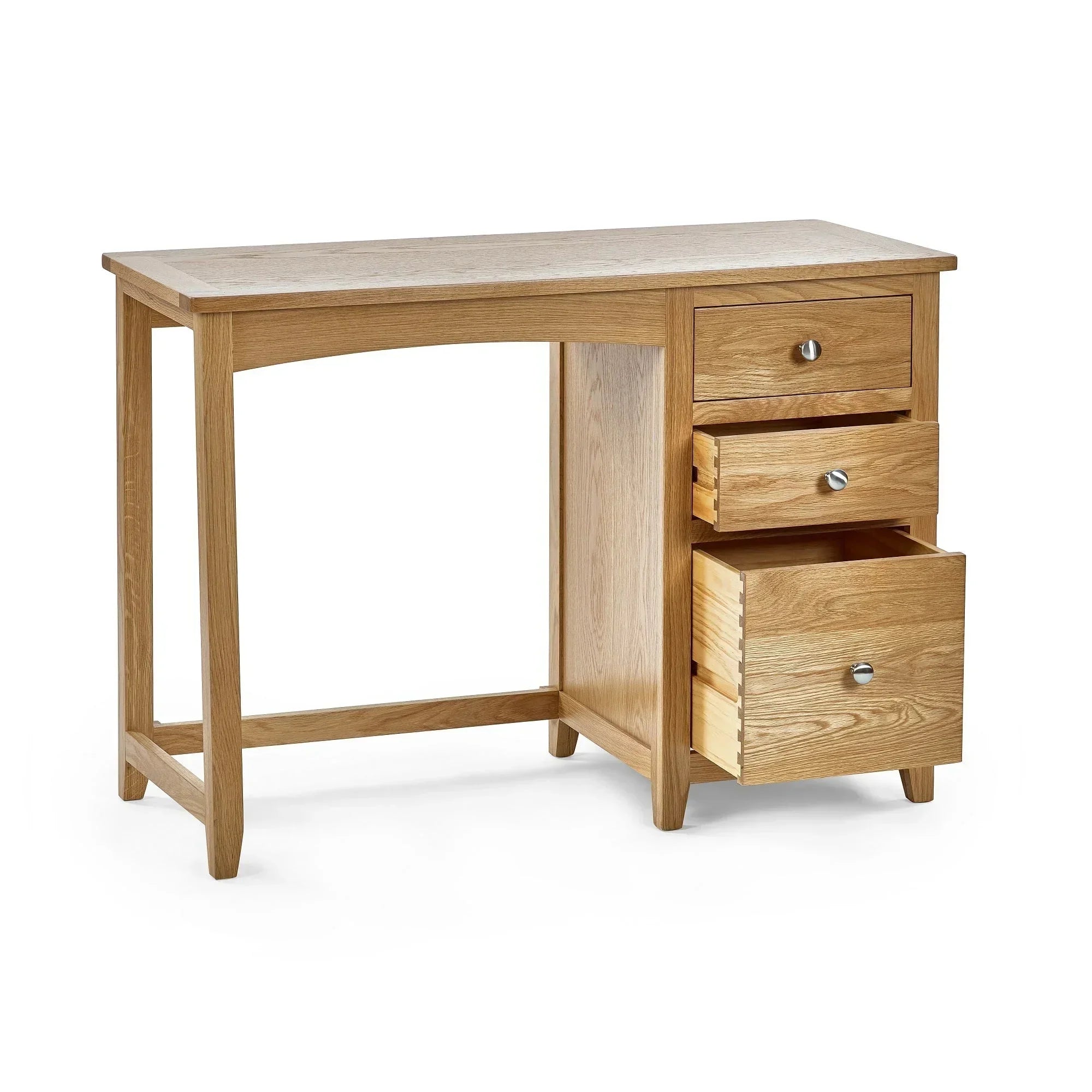 Oak dressing table with three drawers, two open, in cutout view on white background