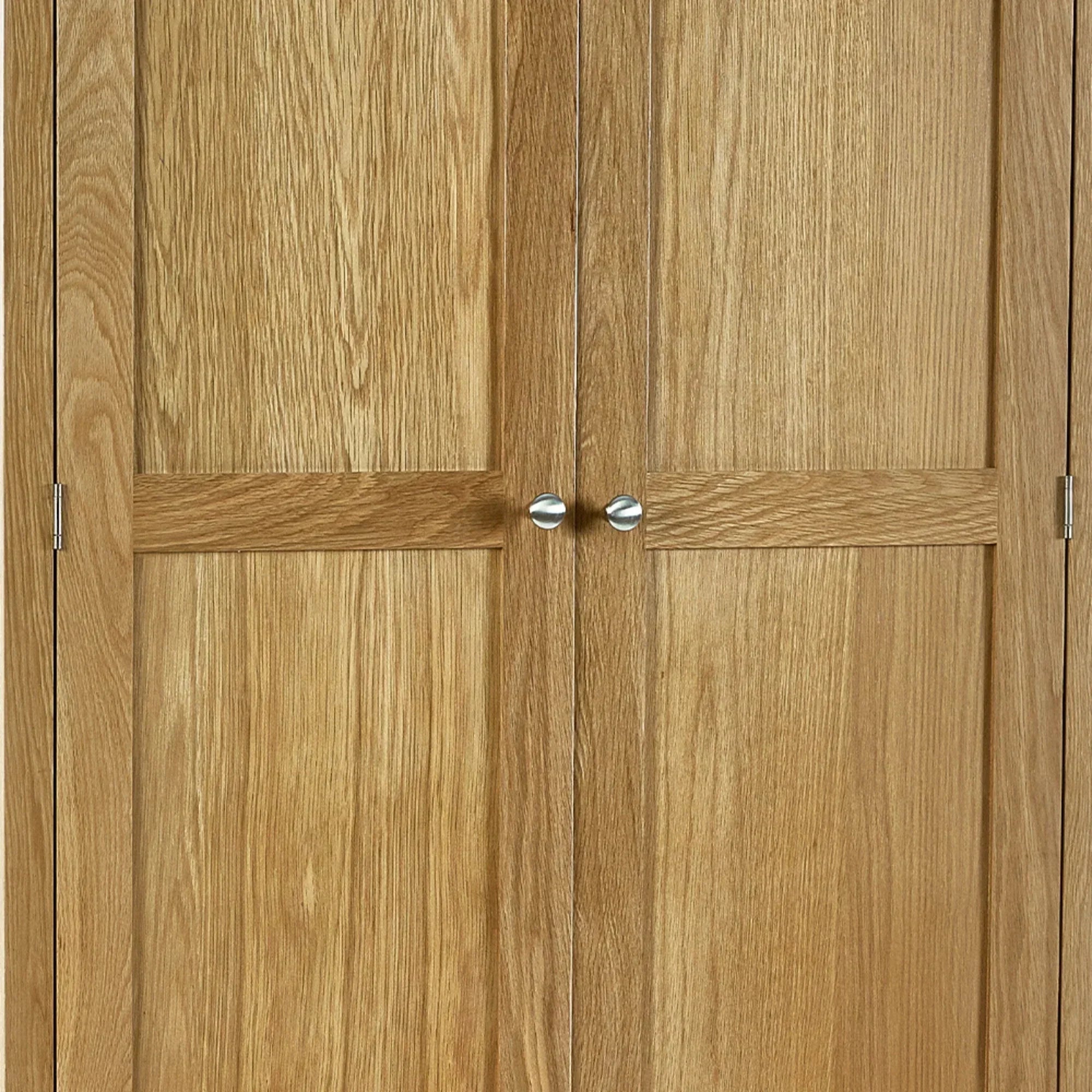 Oak combination wardrobe doors with metal handles and natural wood grain detail
