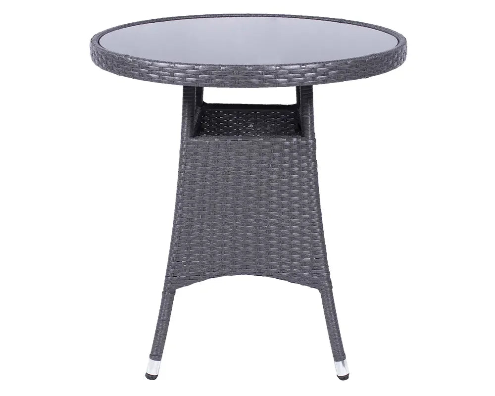 Grey rattan outdoor table with round glass top and open shelf detail